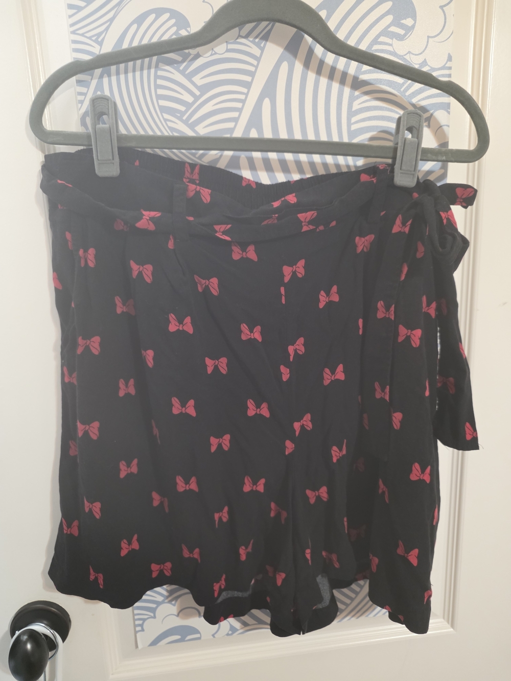 Disney Black Skater Shorts with Red Bow Print